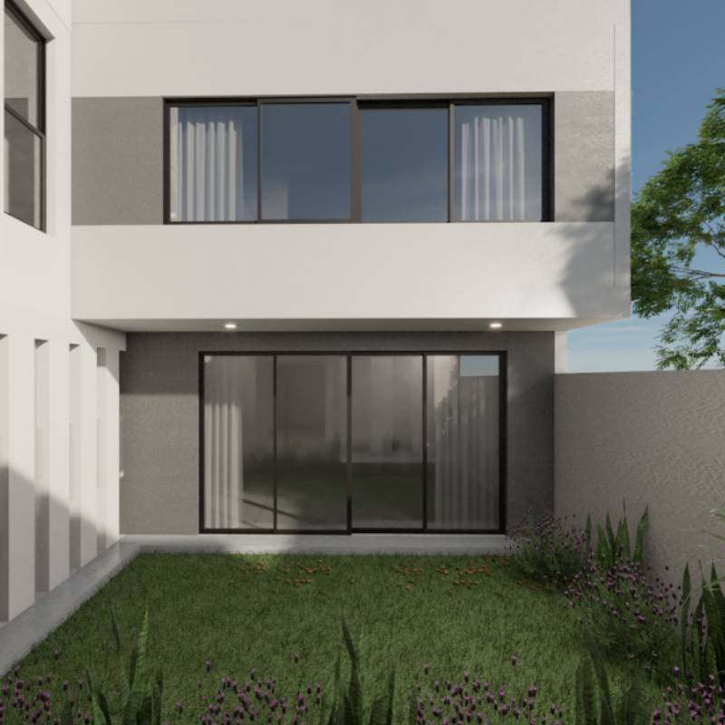 Fachada posterior ventanales jardín