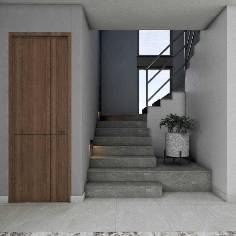 Acceso interior y escalera